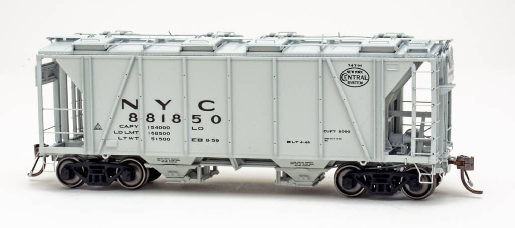 Color photo of HO scale two-bay covered hopper painted gray with black graphics on white background