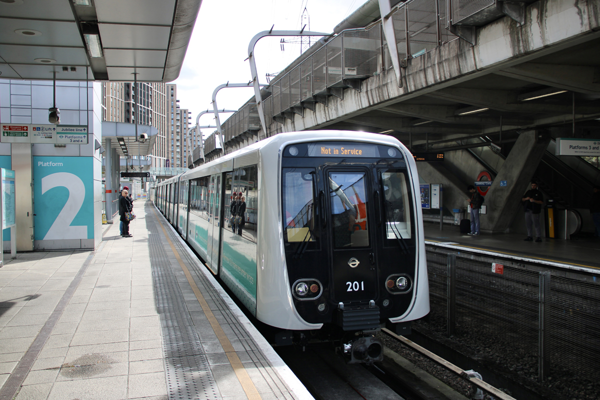 White and blue light rail train