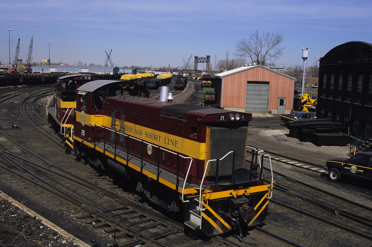 Maroon-and-gold switcher diesels