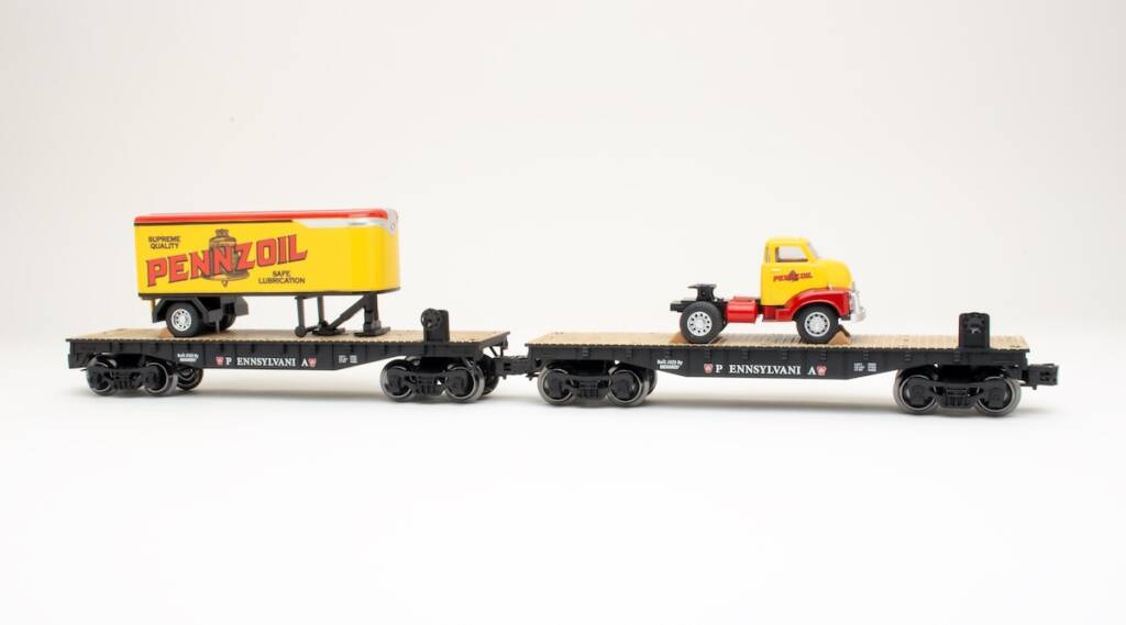 two model flatcars with loads