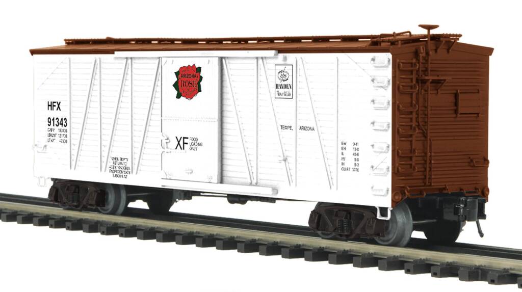 red and white model boxcar