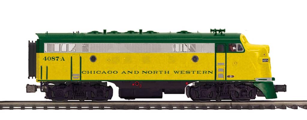 green and yellow model locomotive