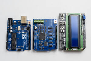 From left: Arduino circuit board and two circuit board shields