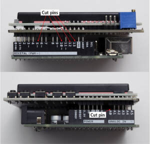 circuit boards stacked with callouts showing which pins to cut