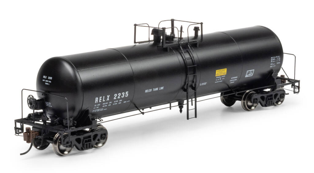 Color photo of HO scale tank car painted black with white graphics on white background