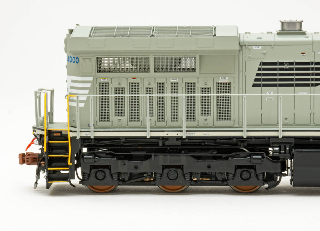 Color photo showing radiator section of HO scale diesel painted gray, black, and white.