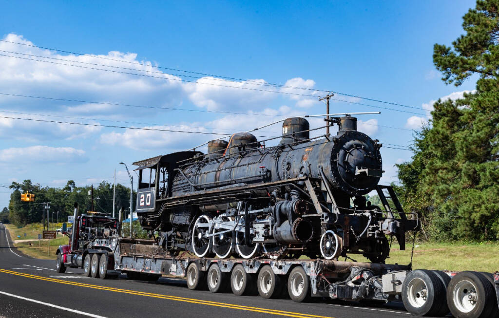 Temple Lumber Co. No. 20 moves to a new home. Steam locomotive be hauled on highway trailer.