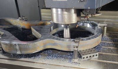 Steam locomotive part being machined. T1 No. 5550 cylinders nearing completion.