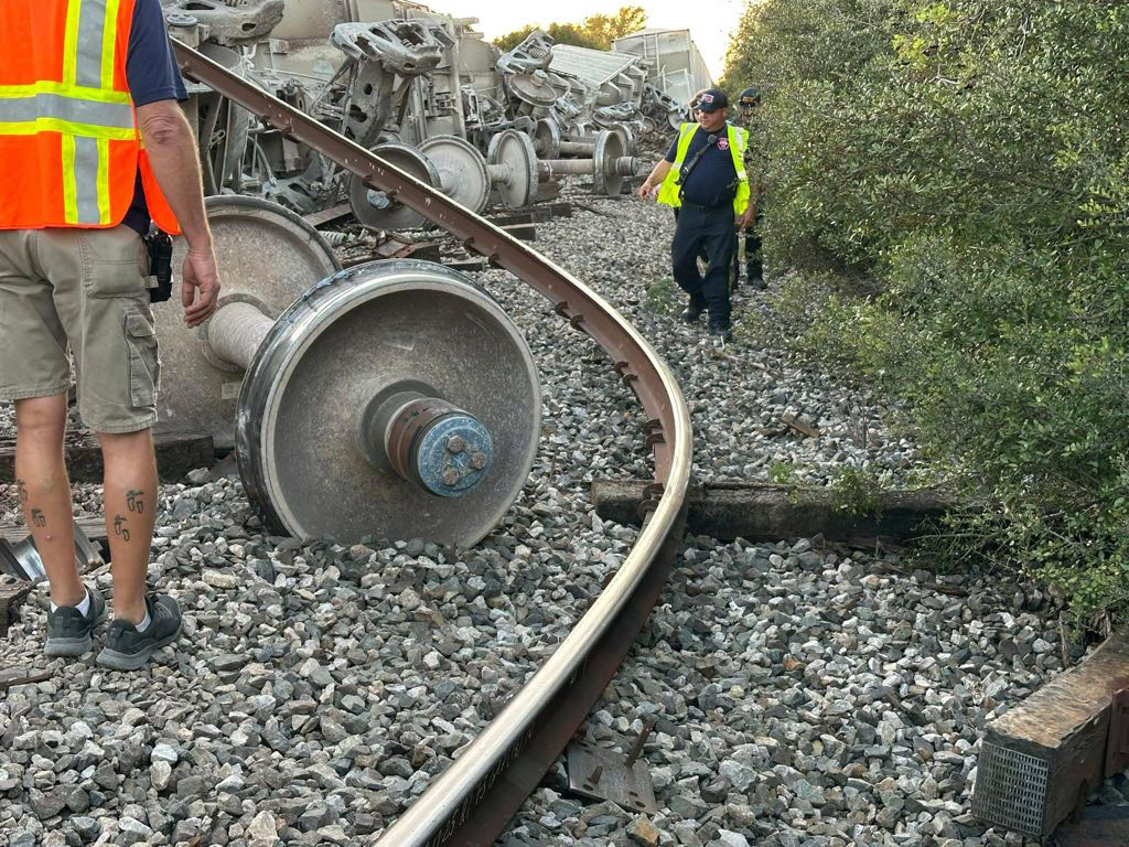Damaged track and derailment debris