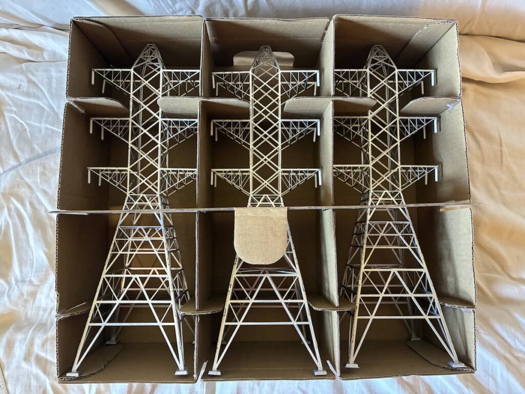three pack of model transmission towers