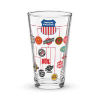 A pint glass which features the family tree of Union Pacific