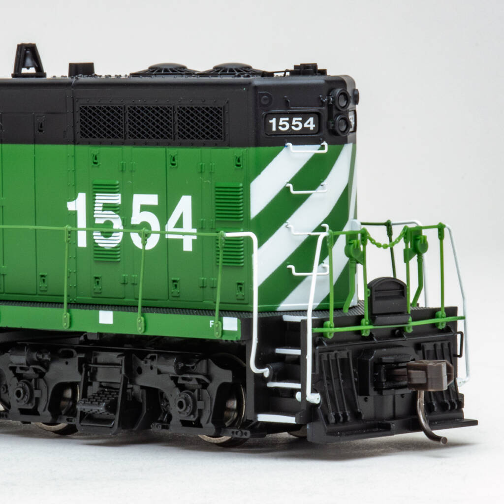 Color photo showing rear of long hood on HO scale GP7 painted Cascade Green and black with white stripes. Road number 1554 is visible on side of hood and in number boards.
