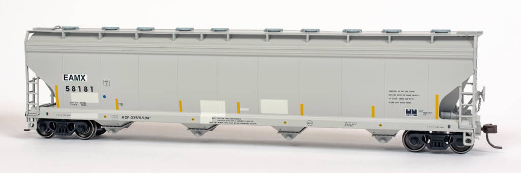 Color photo of HO scale covered hopper painted gray with gray patches, black lettering, and yellow FRA-224 stripes on white background. 