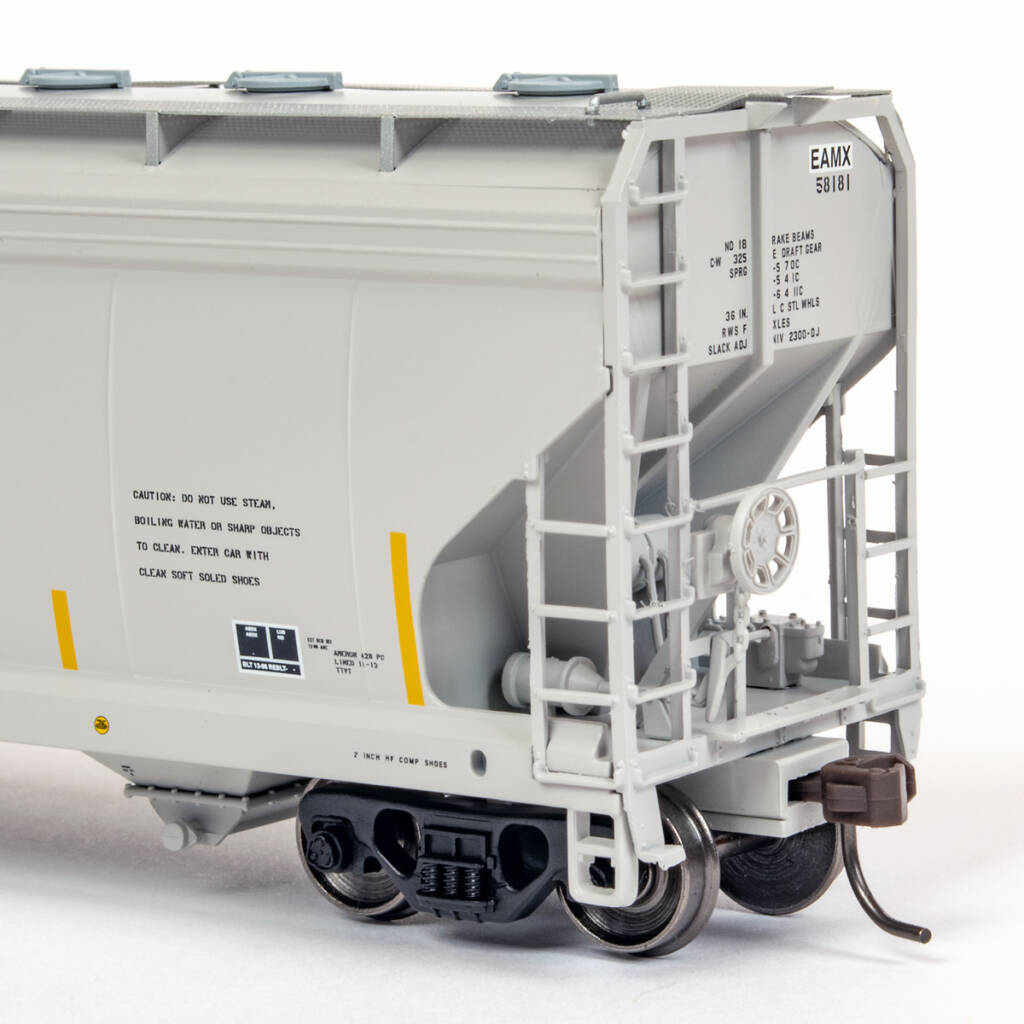 Color photo showing B end of HO scale covered hopper painted gray with black lettering and yellow FRA-224 stripes on white background.