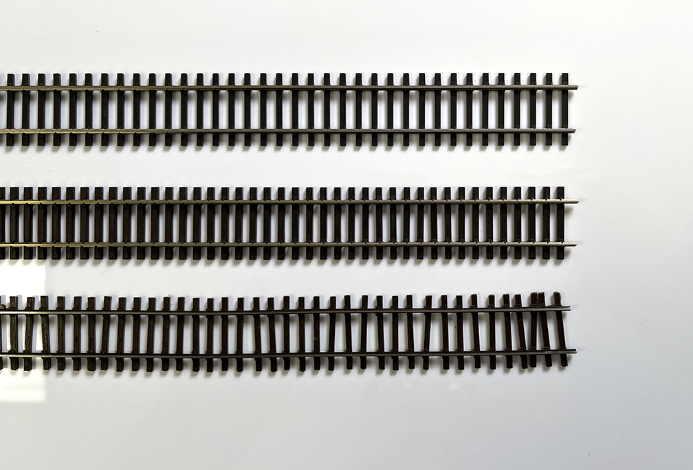 A selection of three types of model railroad track