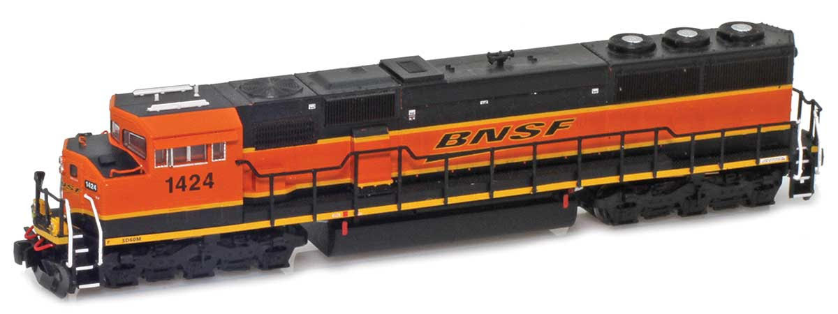 A black and orange model locomotive