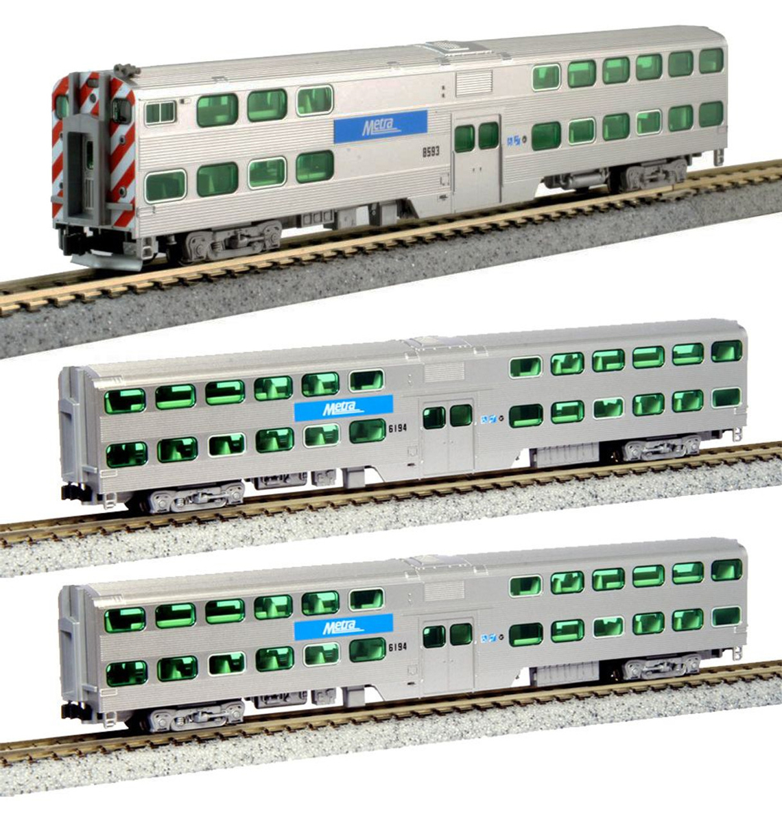 A set of three silver model bi-level passenger cars