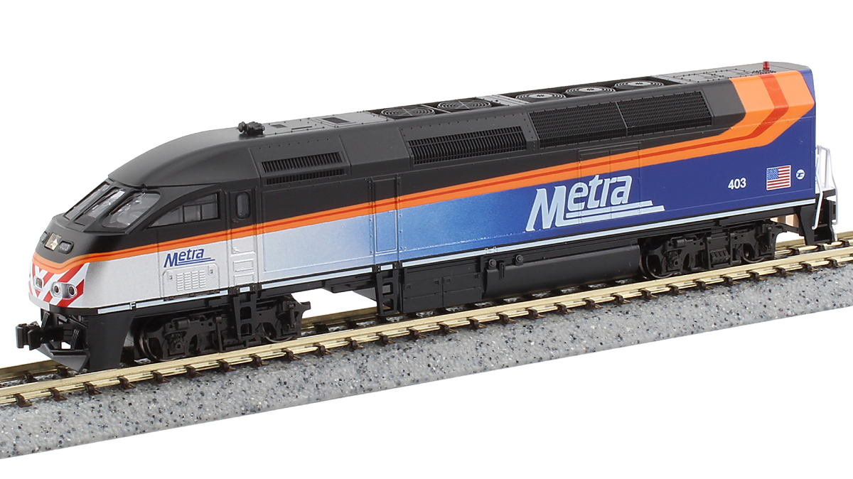 A black, orange and blue model locomotive