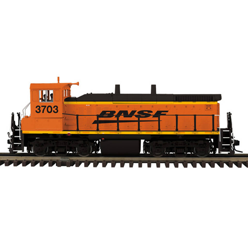 An orange and black model locomotive