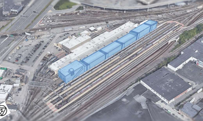 Ilustration of long, narrow building at passenger rail yard