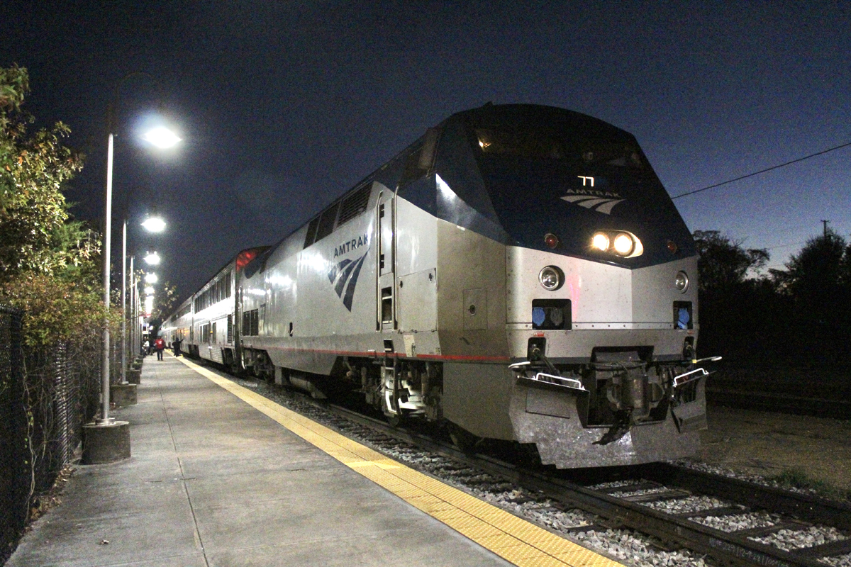 Passenger train at platform at night