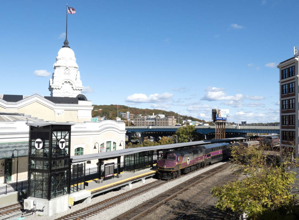 Elevated view of commuter train at large station