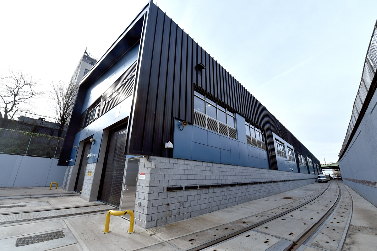 Exterior of building with with entries for two railroad tracks