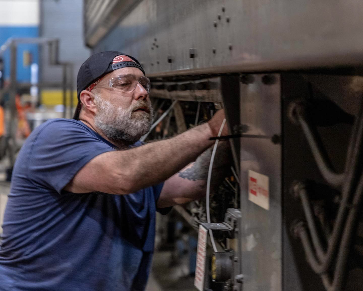 Man working on railcar