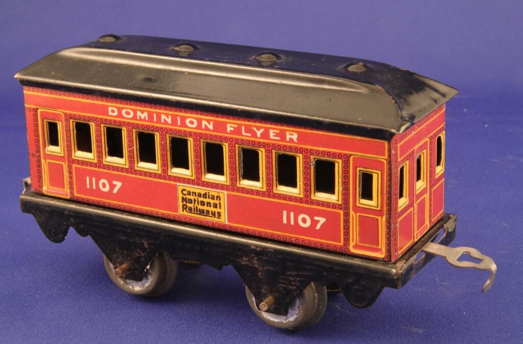 red vintage toy coach car