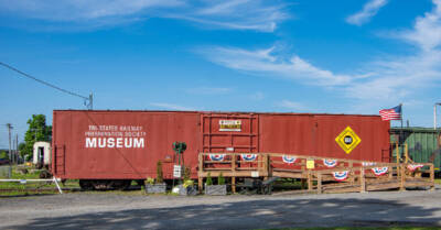 High-cube boxcar lettered as a railroad museum. 