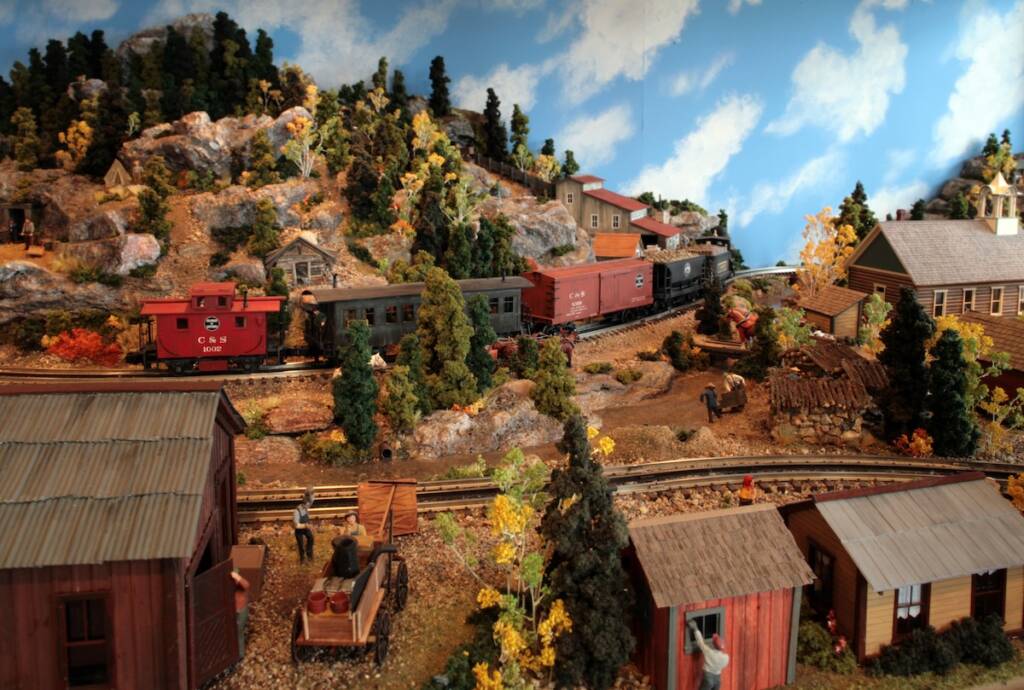 colorful scene on toy train layout