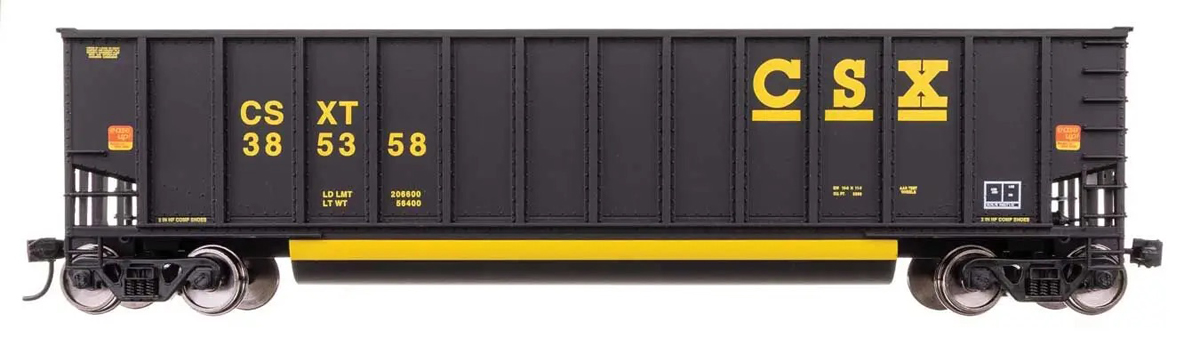 A black and yellow model freight car
