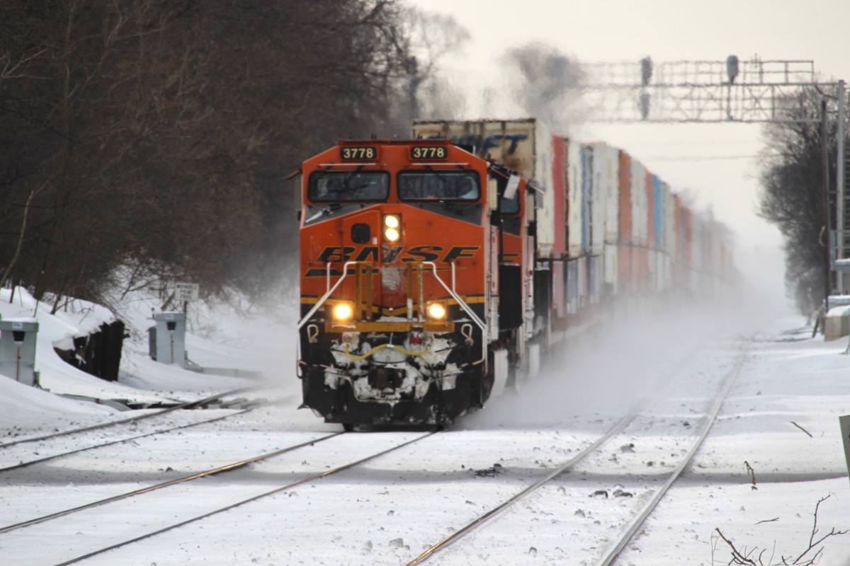 Double-stack train in snow