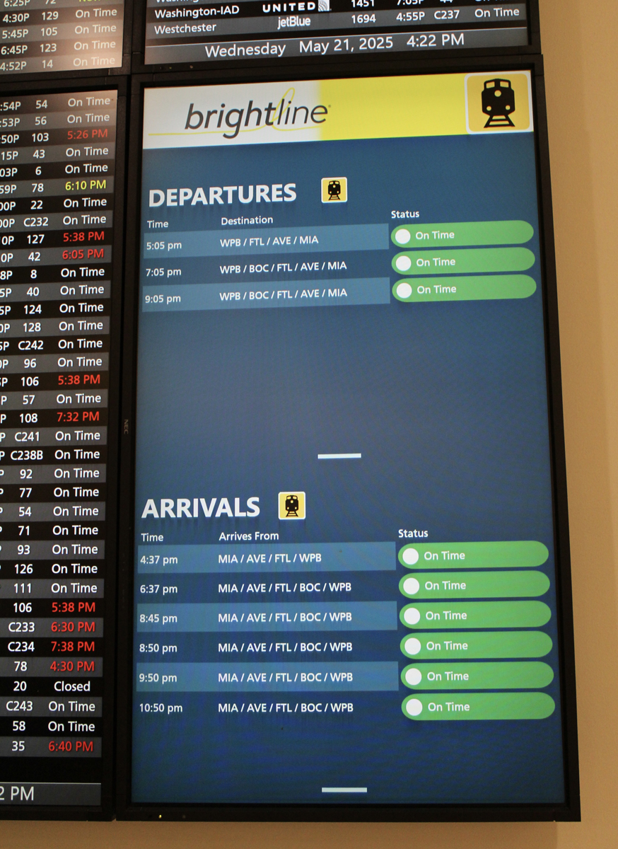 Display board of arrivals and departures for Brightline in Orlando