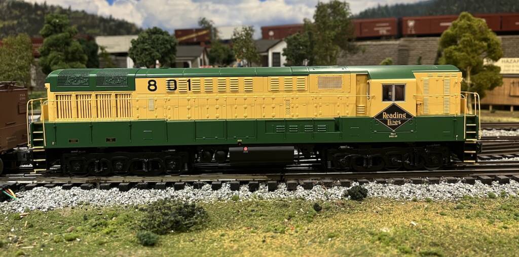 yellow and green model diesel locomotive