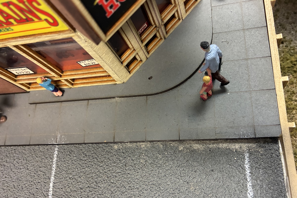closeup of gutters on toy train layout