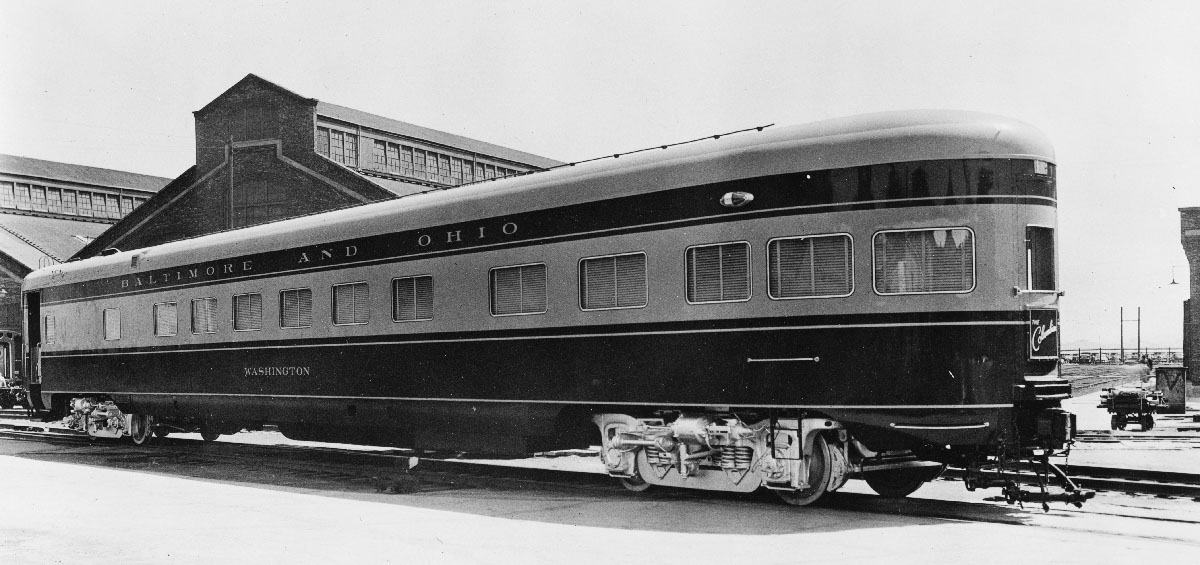 Black and white builder's photo of round-end observation car. B&O museum introduces restored 'Washington'.