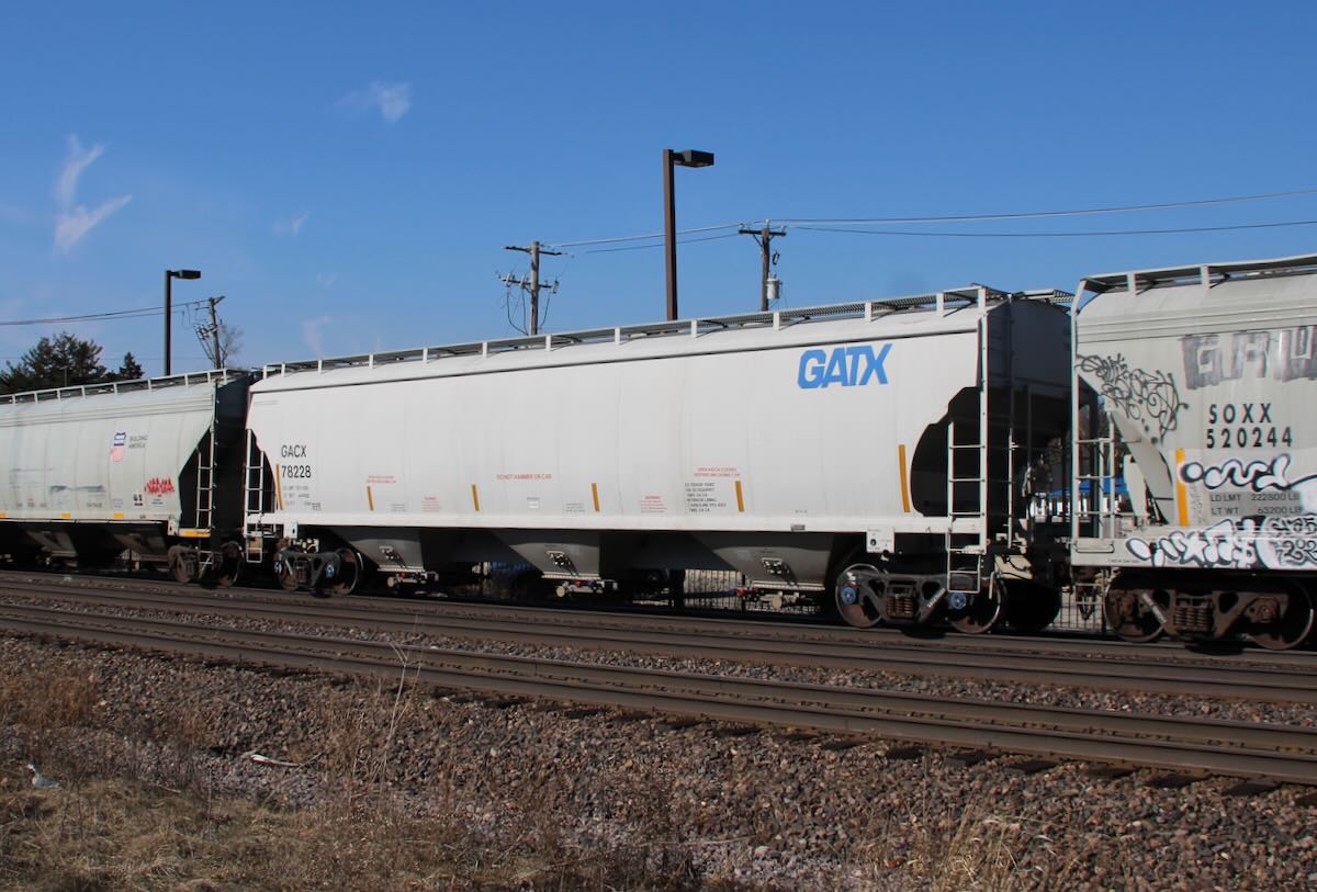 Covered hopper with blue GATX lettering