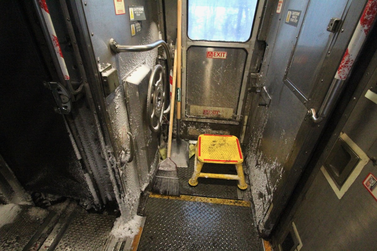 Snow in passenger car vestibule