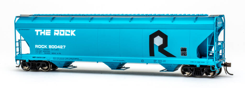 Color photo of HO scale three-bay covered hopper painted blue with black and white graphics.