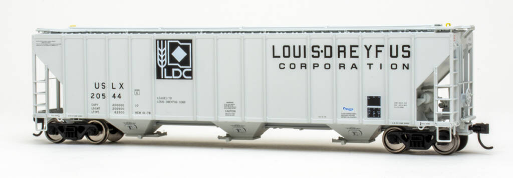Color photo of HO scale three-bay covered hopper with exterior posts painted gray with black and white graphics on white background.
