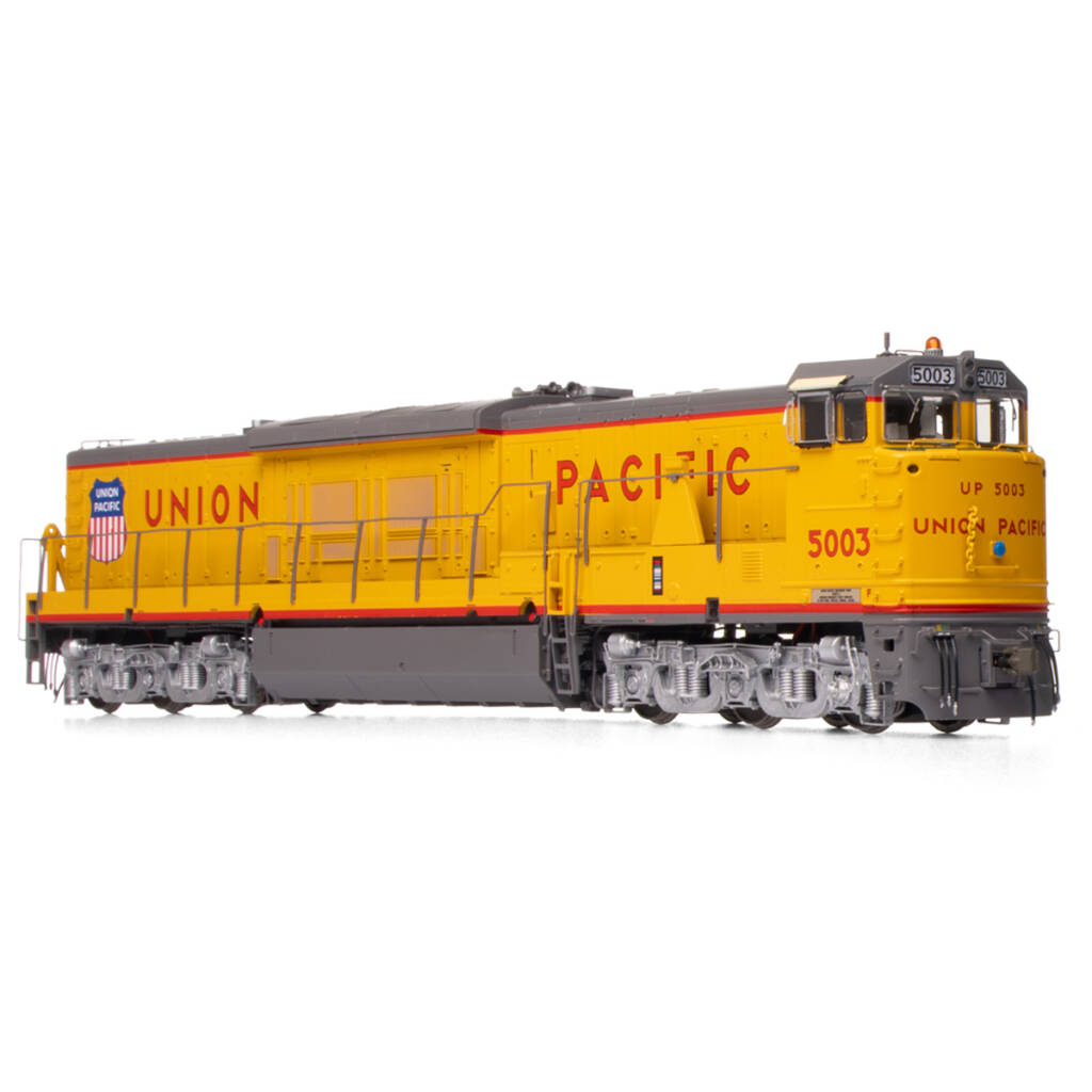 A yellow and gray model locomotive