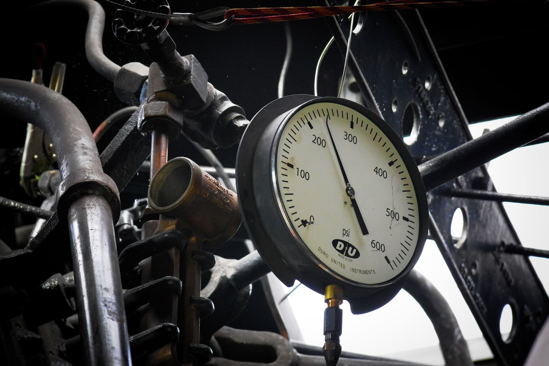 Close-up of pressure gauge in steam locomotive cab