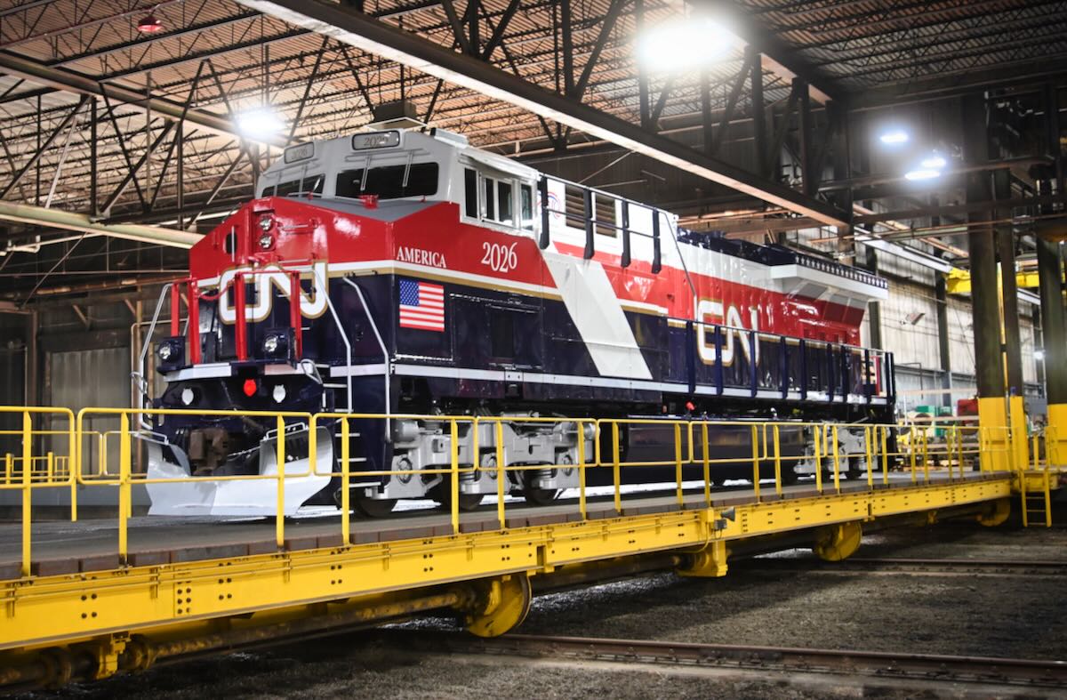Red, white, and dark blue striped locomotive