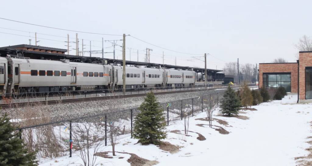 Electrified commuter train at station